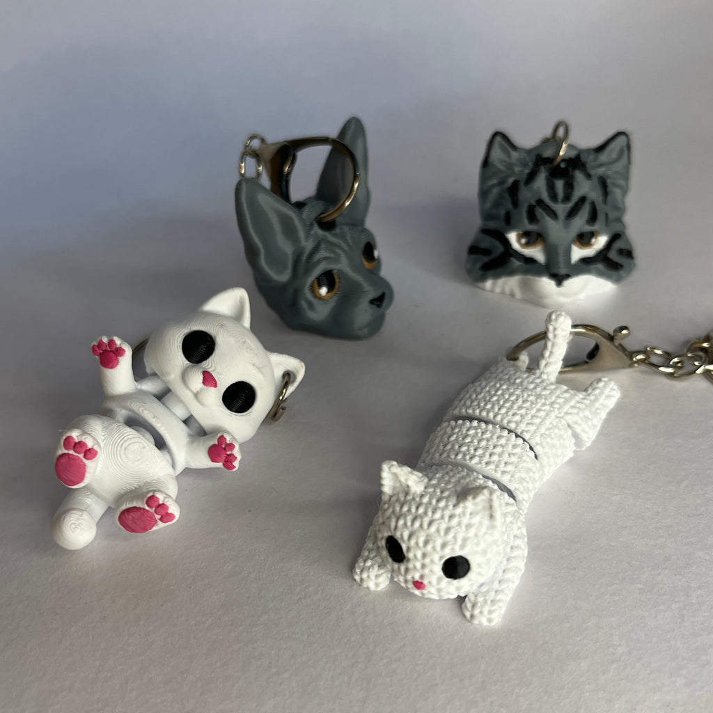 Cute 3D Cat Keychain Collection – Flexible & Realistic Cat Keychains (Furry, Sphynx, Pink Paw & Knitted Cat Variants)