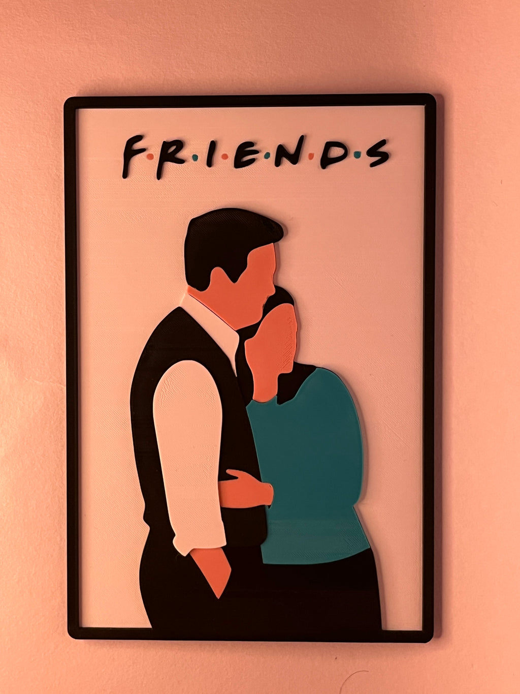 Illustration of two people embracing with 'FRIENDS' text on a peach background