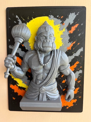 Statue of a monkey deity holding a mace against a colorful background