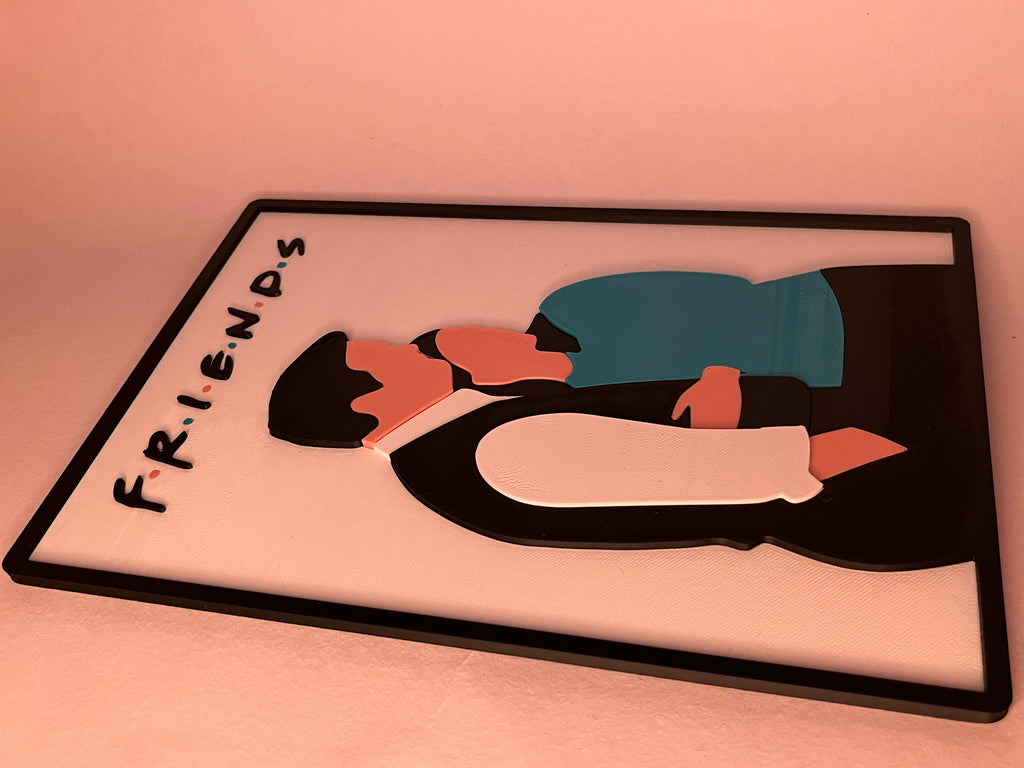 Plaque with 'F.R.I.E.N.D.S' design on a pink background